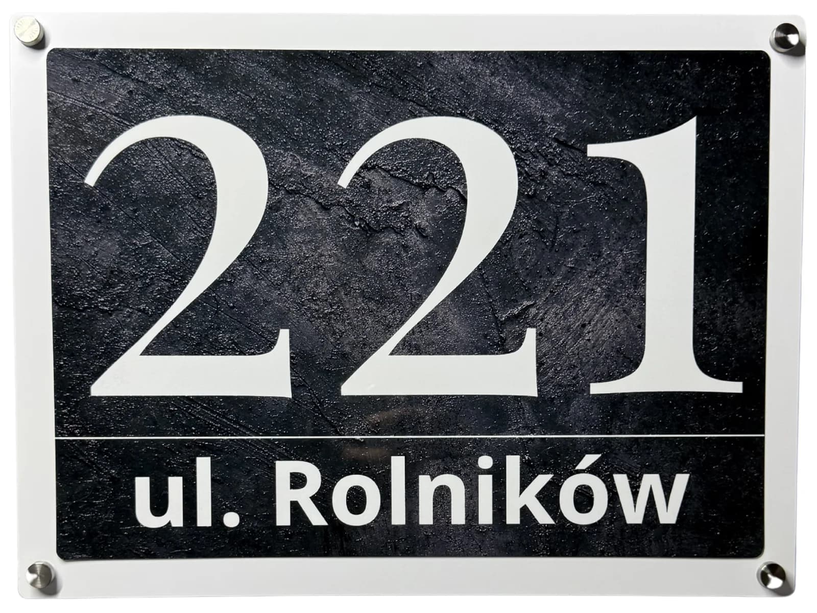 Bolot Studio address sign mounted with stainless steel standoff hardware creating an elegant floating effect on the wall