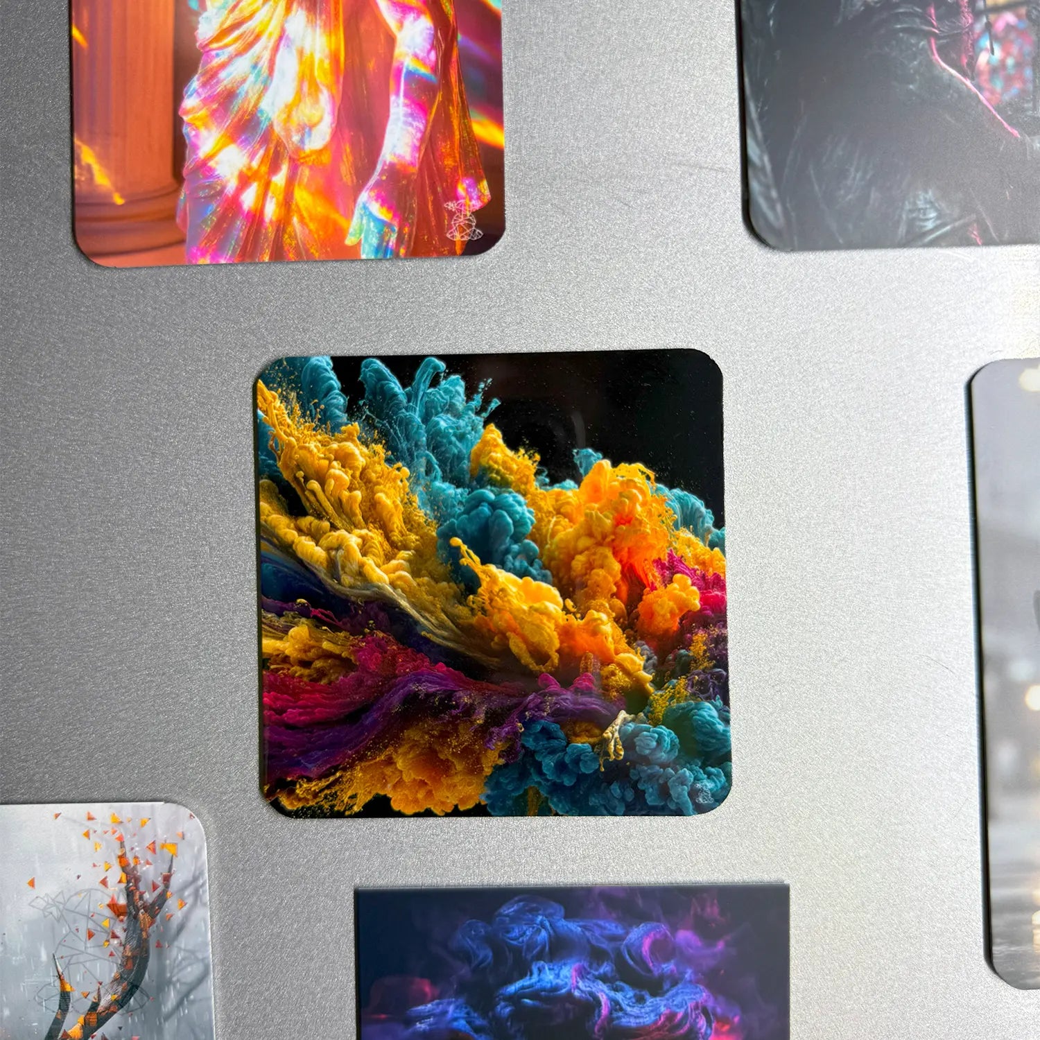 Custom metal magnet featuring an abstract explosion of colorful paint-like textures in yellow, blue, and magenta — bold and modern.