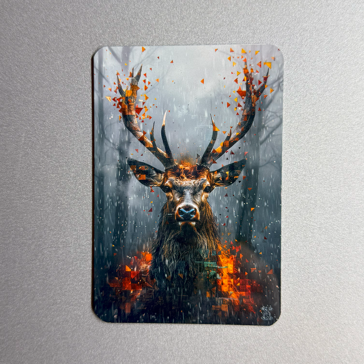 Decorative metal plate with a deer illustration on a gray background