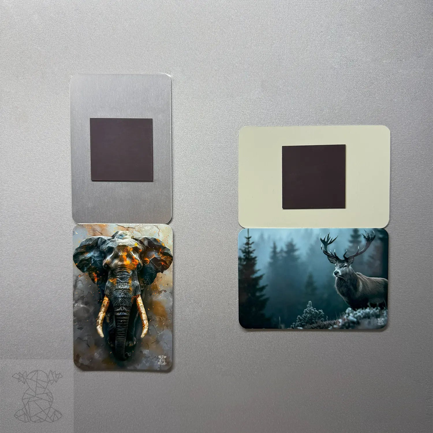 Back view of two custom metal magnets showing magnet placement, with fantasy-style elephant and deer artwork printed on the front — durable and artistic.
